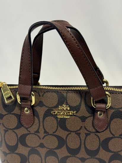 شنطة كوتش بني