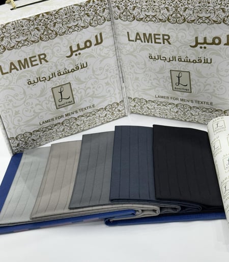 قماش ملكي مقلم عريض بخيوط من نفس اللون