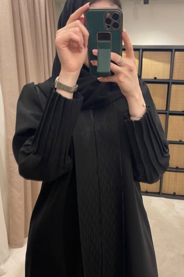 عباية بأزرار