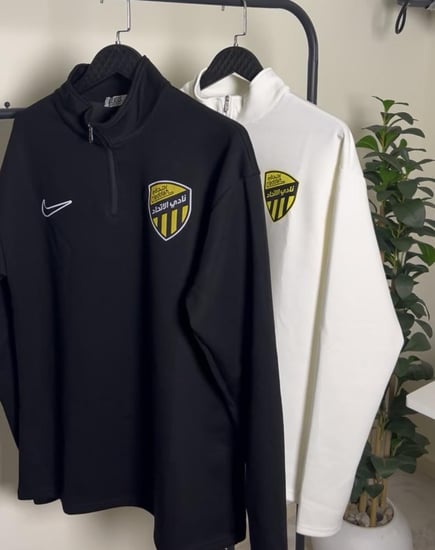 سويتر نادي الاتحاد 2025 الأسود والأبيض – فخامة وراحة لا مثيل لها