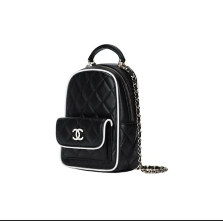 CHANEL BLACK BACKPACK حقيبة شانيل ظهر أسود بإطار أبيض