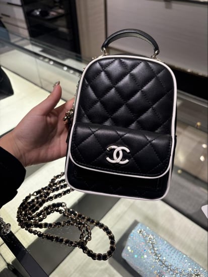CHANEL BLACK BACKPACK حقيبة شانيل ظهر أسود بإطار أبيض