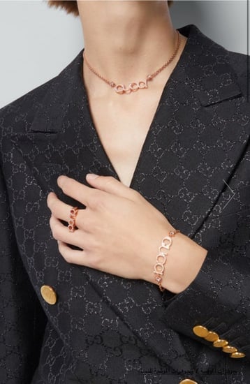 2024 قوتشي خاتم معدن وردي مرصع بالكريستال