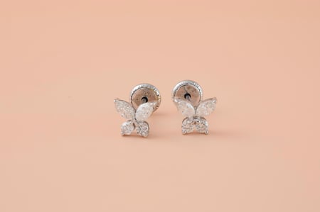 أقراط ذهب فراشة