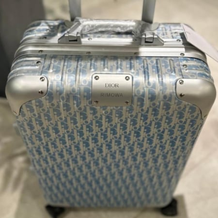حقيبه سفر ديور x ريموا