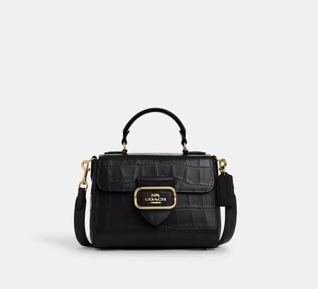 شنطة coach
