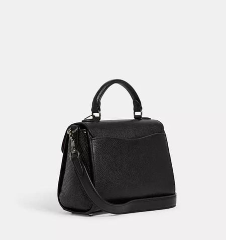 شنطة coach