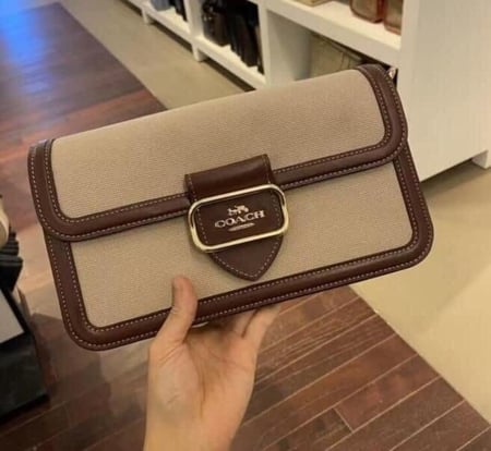 شنطة coach