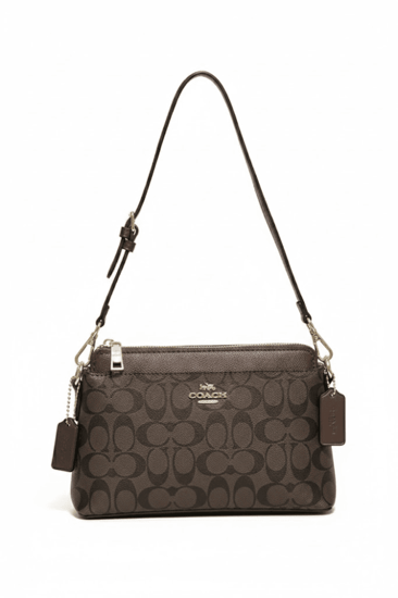 حقيبة كوتش سيجنتشر بني أصلية مع الملحقات