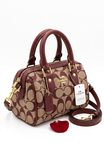 شنطة كوتش ميني بوسطن عنابي مع الملحقات