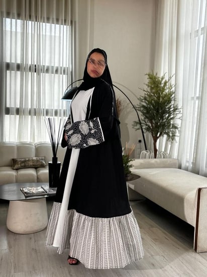 عباية كريب لنن سوداء أنيقة من متجر هيا