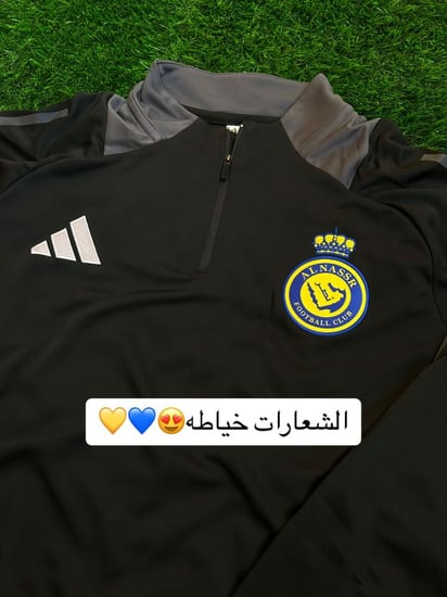 سويتر رياضي بشعار النصر لون اسود