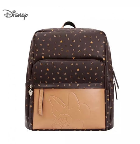 شنطة من ديزني جلد  محفور عليها صورة (ميكي) او( ميني )عملية وفخمة مناسبة للمدرسة او الجامعة او لاحتياجات الاطفال والمواليد