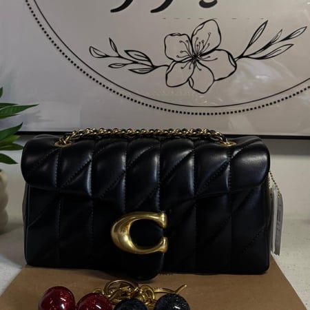 كوتش تابي لوقو ذهبي