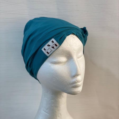 القبعه المبطنه - لون الفيروزي المرجاني