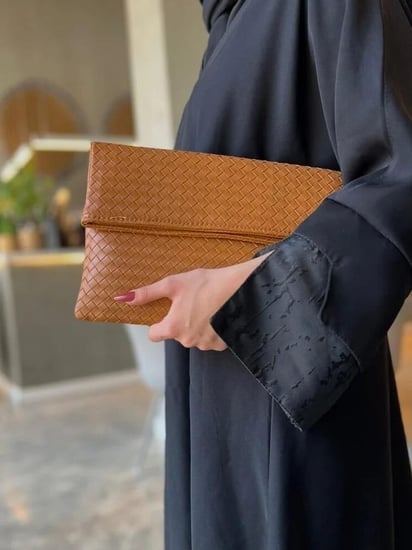 شنطة باوتش الجلدية