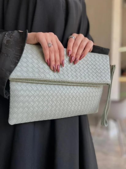 شنطة باوتش الجلدية