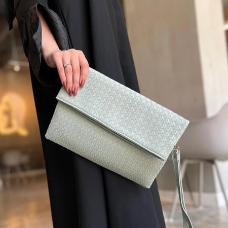 شنطة باوتش الجلدية