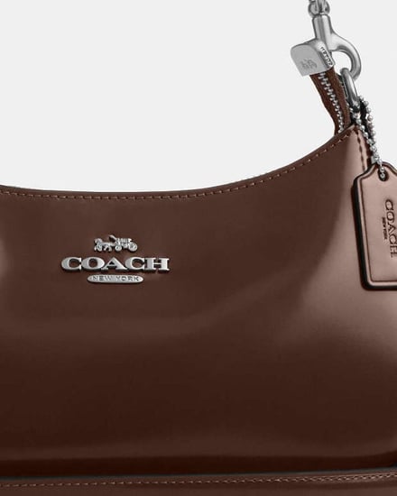 شنطه كوتش بنيه ساده صغيره