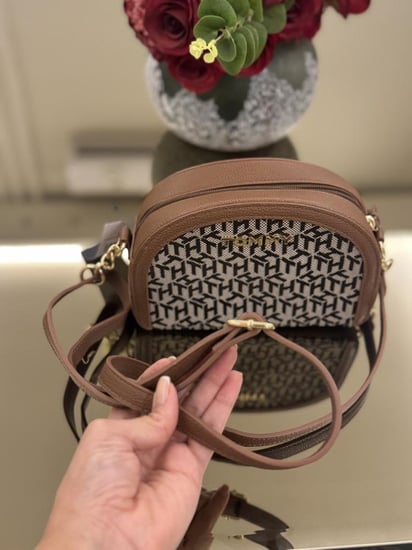 شنطه تومي نص دائره يوميه