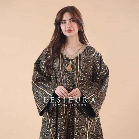 جلابيه اسود وذهبي