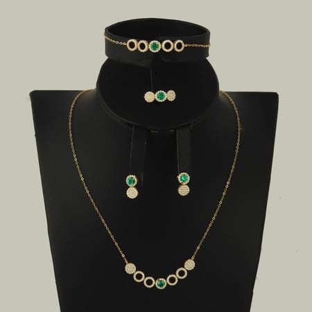 طقم ذهب كامل عيار 18 باشكال دوائر الزركون المزينة بالفص الاخضر البراق