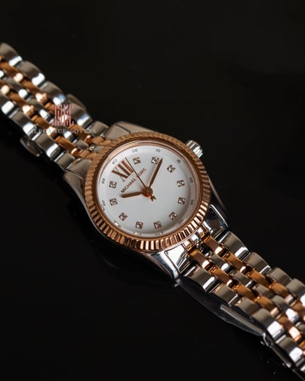 ساعة مايكل كورس