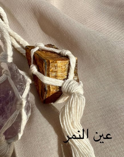 ميداليه شنطة حجر كريم خام