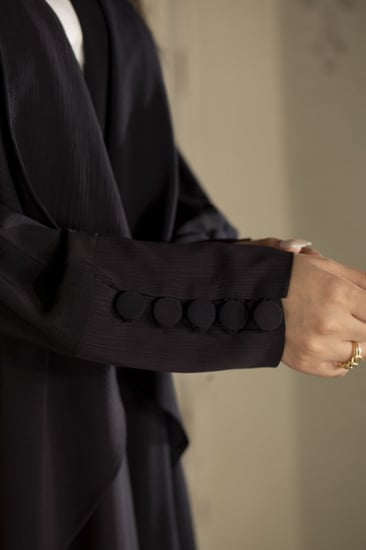 عباية كحلي بكسرات جانبية