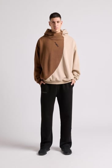 هودي بقصة واسعة ورقبة عالية بشعار سيلين للجنسين بني + أوف وايت