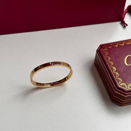 اسوارة كارتير لوف ذهبي ساده