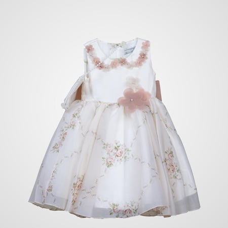 فستان ابيض بورود وفيونكه لحمية