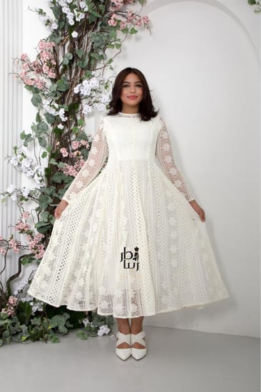 فستان دانتيل راقي أنيق سكري من كولكشن فساتين العيد من دار رينا