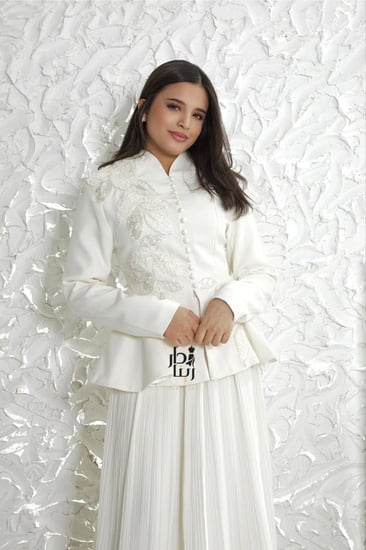 تيور أنيق قطعتين سكري للعيد مع تنورة بليسيه طويلة