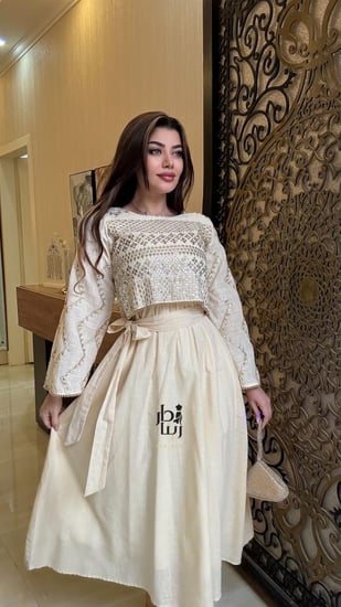 تفاصيل تنورة جلابية ميد مطرز سكري بقصة A-LINE