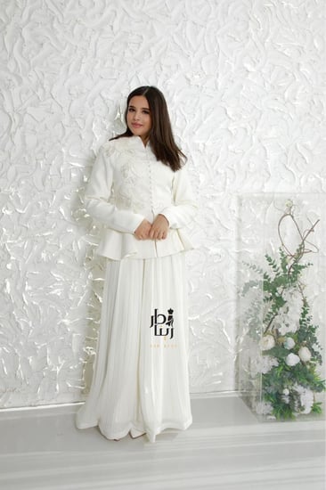 إطلالة علوية لتيور العيد السكري بجاكيت أنيق من دار رينا