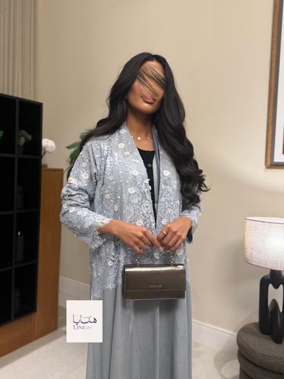 عباية دلع بقماش روز صيفي مع دانتيل مزين بهدب سماوي