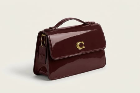 حقيبة كوتش يد أنيقة – تصميم كلاسيكي بلمسة عصرية . ماستر كوالتي