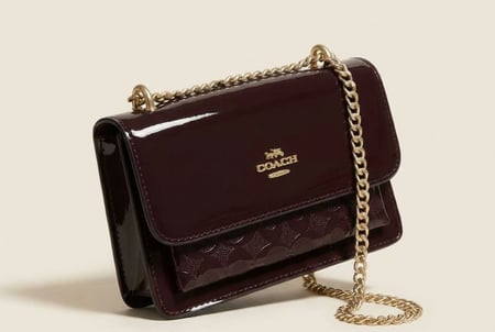 حقيبة كوتش تابي – فخامة عصرية بتصميم مبطن أنيق . ماستر كوالتي