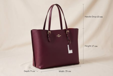 حقيبة كوتش COACH الكبيرة بطابع فاخر بتصميم كلاسيكي أنيق