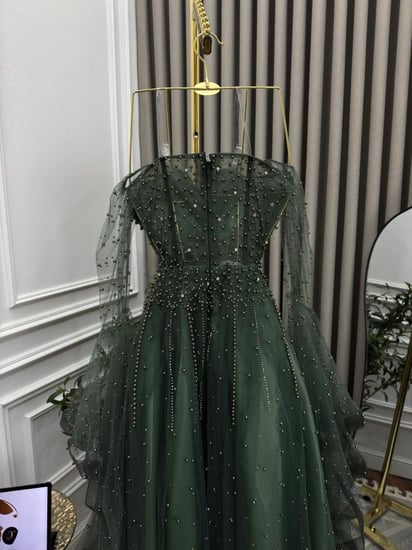 تل مطرز زيتي