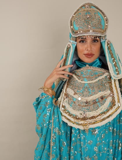 لبس المديني السماوي للعروسه