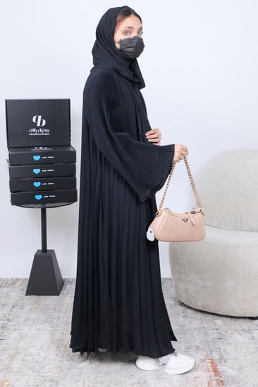 عباية قماش راما موديل كلوش الأكمام واسعة بلاسيه مكسّر BB090