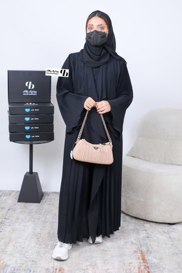 عباية قماش راما موديل كلوش الأكمام واسعة بلاسيه مكسّر BB090
