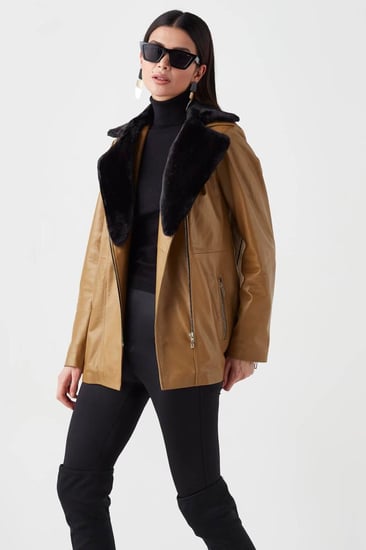 معطف واق من المطر للنساء من الجلد الطبيعي من DERIZA