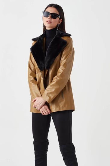 معطف واق من المطر للنساء من الجلد الطبيعي من DERIZA