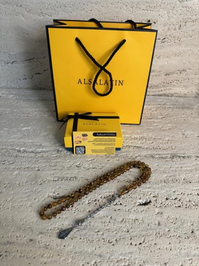 سبحة كهرمان حر  شوائب طبيعية مذهب مع شكة ذهبي