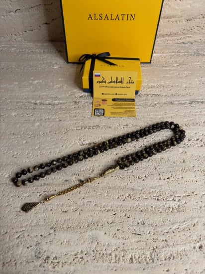 سبحه كهرمان حر شوائب طبيعية مع ستيل ذهبي