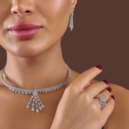 طقم ذهب ابيض و الماس عيار 18