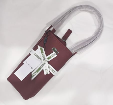 شنطة لاكوست فيس عنابي